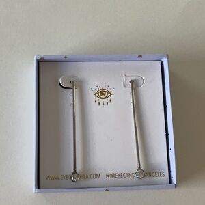 Silver and rhinestone 3 inch drop piercedearrings. Excellent condition.